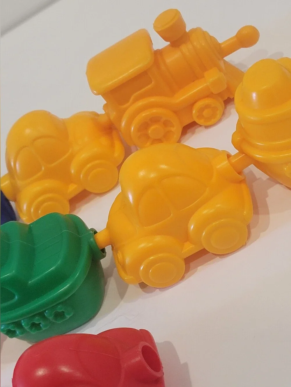 Colorful Interlocking Toy Train Cars - Red, Blue, Green, Yellow